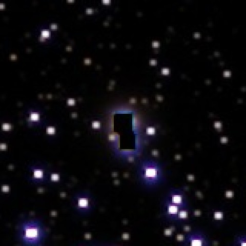 A bright star in M 35 from the old stacker: a black square hole in its core