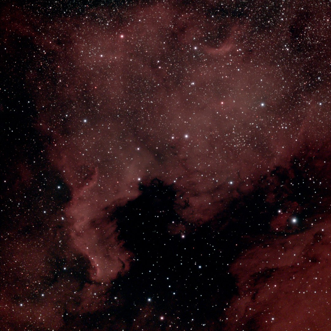 A synthetic stack of NGC 7000, rendered from catalogs and survey maps